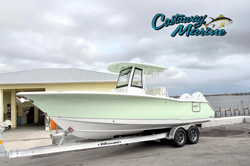 The Image of 2026 Sea Hunt Ultra 265 SE boat on trailer at Castaway Marine dealership. - 0