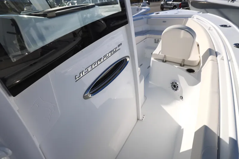 Slide: The Image of 2026 Sea Hunt Ultra 265 SE boat interior with seating and branding details. - 10