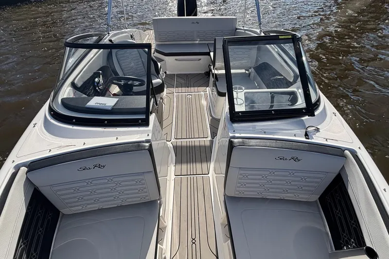 Slide: The Image of 2025 Sea Ray 21 SPX OB boat interior with sleek seating and modern design. - 19