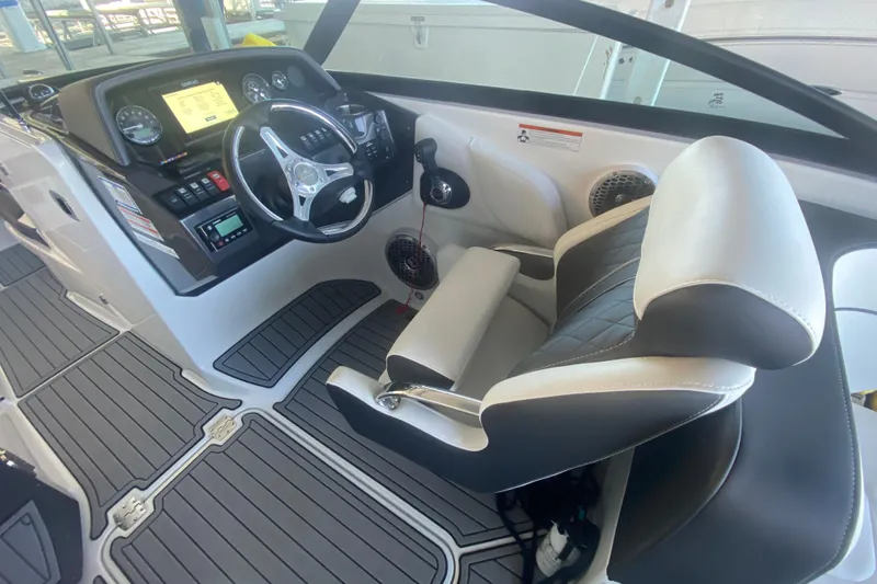 Slide: The Image of 2022 Monterey M-65 boat interior with modern dashboard and steering wheel. - 11