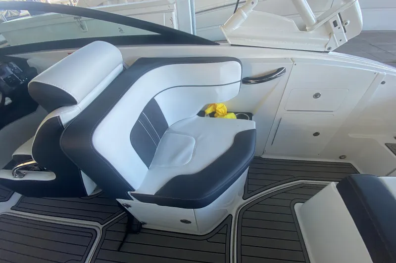 Slide: The Image of 2022 Monterey M-65 boat interior with white and black seating, modern design. - 8