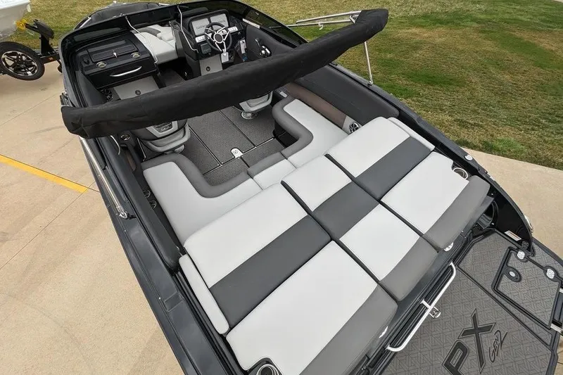 Slide: The Image of 2024 Crownline 240 SS LPX boat interior with spacious seating and modern design. - 6