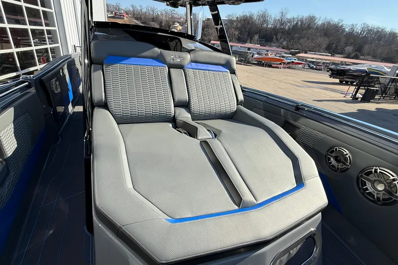 Slide: The Image of 2026 Sunsation 34 CCX boat interior with sleek seating and modern design. - 17