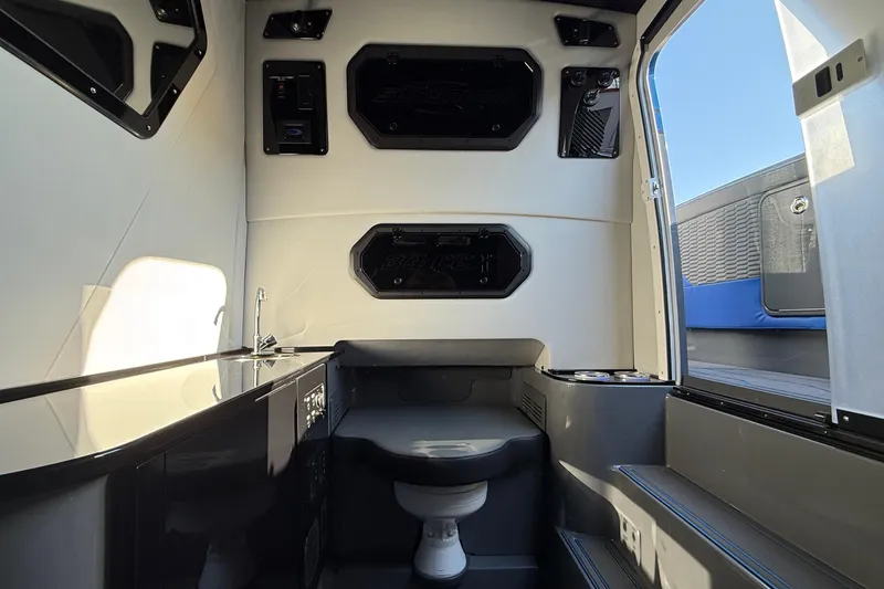 Slide: The Image of Interior of 2026 Sunsation 34 CCX boat featuring modern amenities and sleek design. - 23