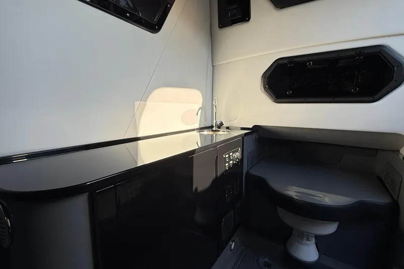 Slide: The Image of Interior of 2026 Sunsation 34 CCX boat featuring sleek design and modern amenities. - 24