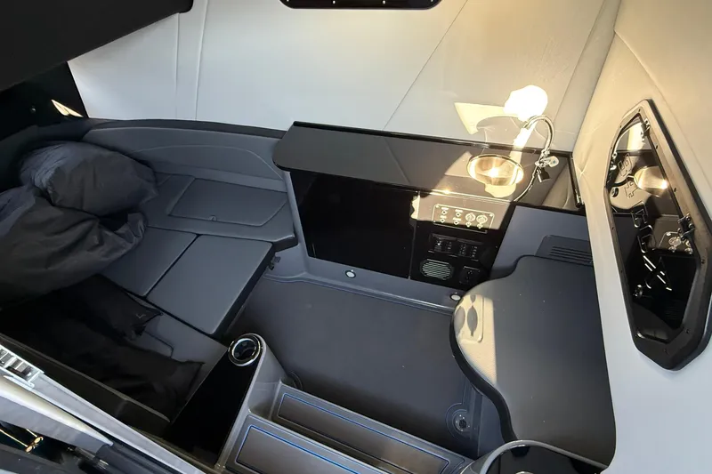 Slide: The Image of 2026 Sunsation 34 CCX cabin interior with modern amenities and sleek design. - 27