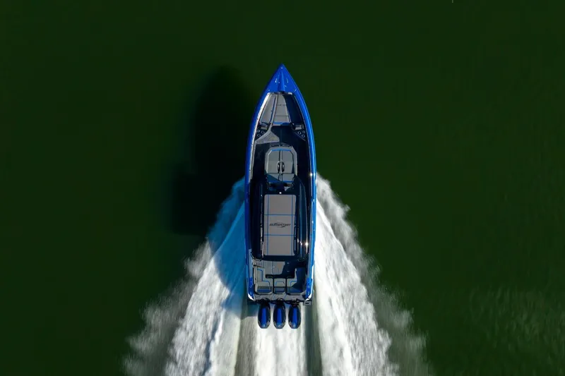 Slide: The Image of 2026 Sunsation 34 CCX speedboat cruising on water, aerial view. - 51