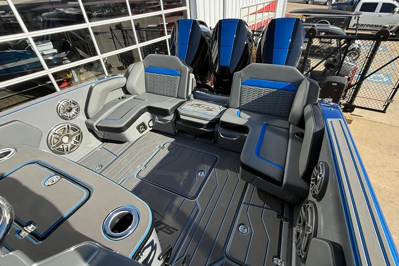 Slide: The Image of 2026 Sunsation 34 CCX boat interior with modern seating and sleek design. - 7