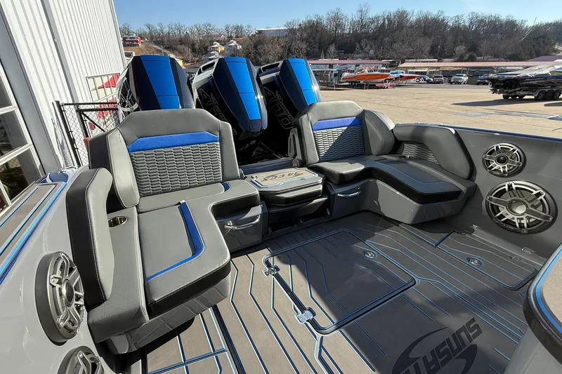 Slide: The Image of 2026 Sunsation 34 CCX boat interior with modern seating and powerful engines. - 8