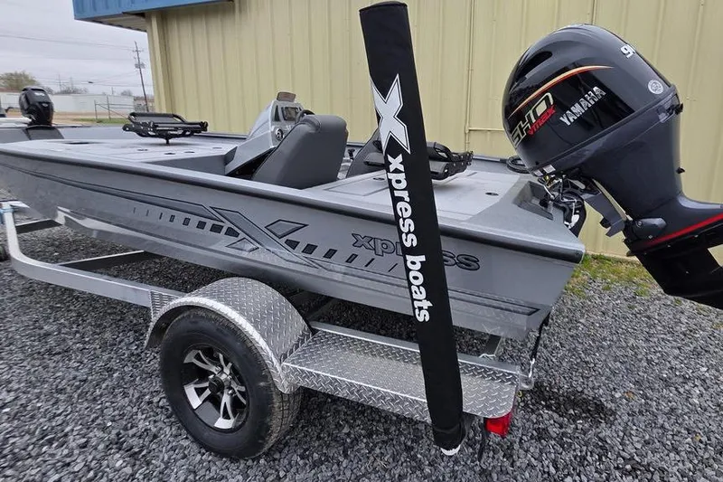 Slide: The Image of 2026 Xpress H17C Crappie boat on trailer with Yamaha outboard motor. - 22