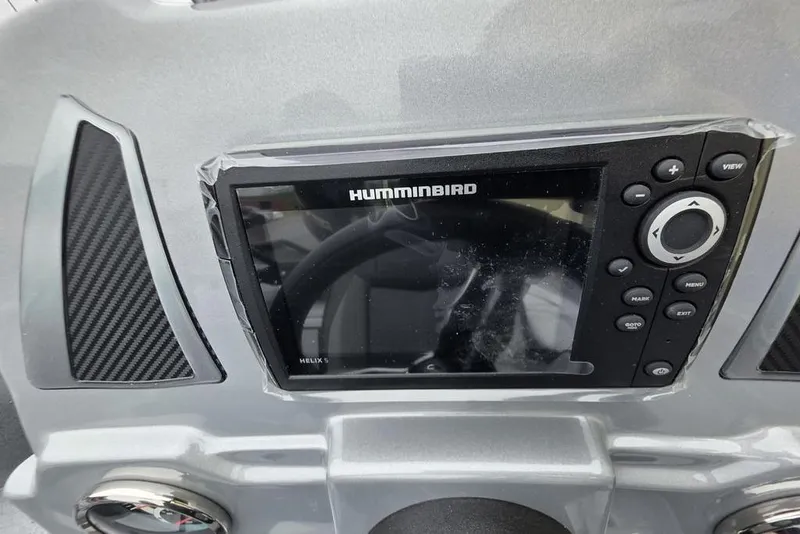 Slide: The Image of 2026 Xpress H17C Crappie boat dashboard with Humminbird Helix 5 fish finder. - 9