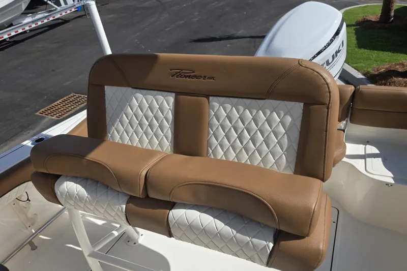 Slide: The Image of Luxurious seating on 2026 Pioneer 222 Islander boat with diamond-stitched upholstery. - 5