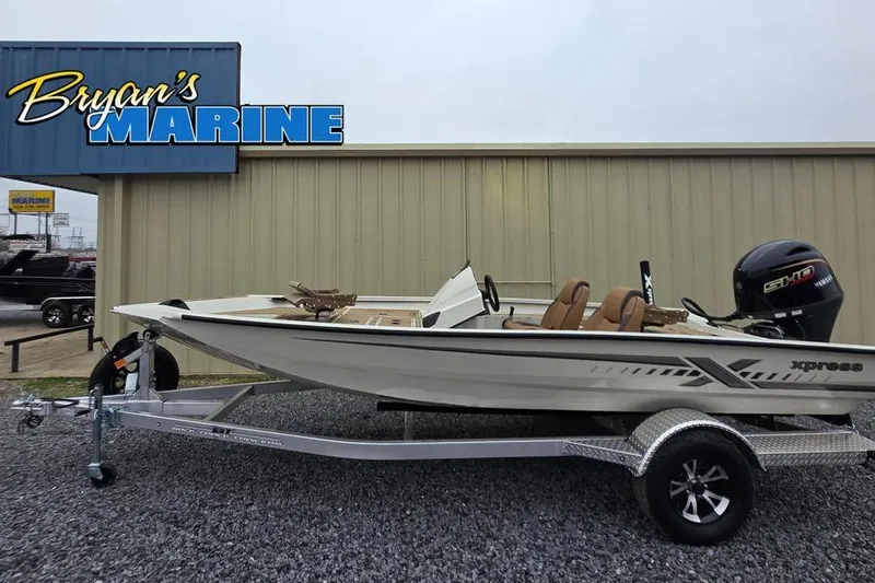 The Image of 2026 Xpress H18C Crappie boat on trailer at Bryan's Marine dealership. - 0