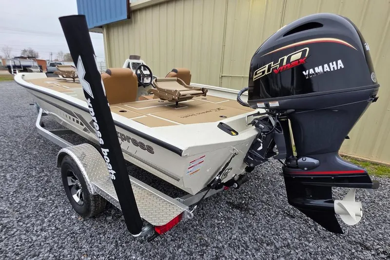 Slide: The Image of 2026 Xpress H18C Crappie boat with Yamaha SHO VMAX engine on trailer. - 5