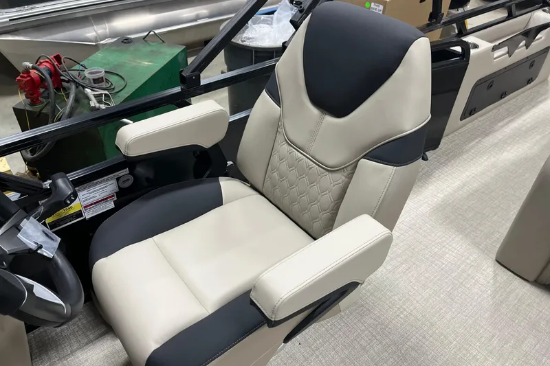 Slide: The Image of 2026 Tahoe Pontoon Sport 85 Versatile Rear Bench 23 captain's chair, beige and black design. - 12