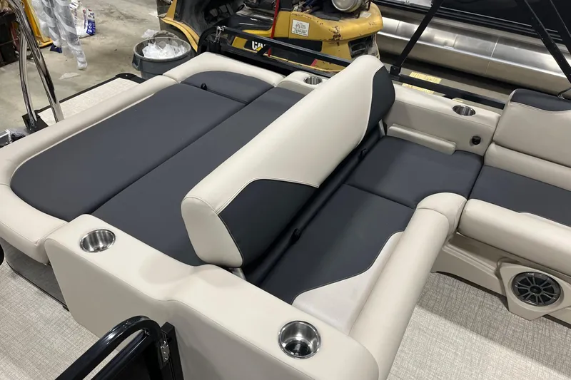 Slide: The Image of 2026 Tahoe Pontoon Sport 85 Versatile Rear Bench 23, featuring luxurious seating and cup holders. - 7