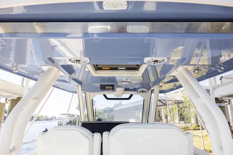 Slide: The Image of 2023 Pursuit S 328 Sport boat interior with sleek design and modern features. - 8