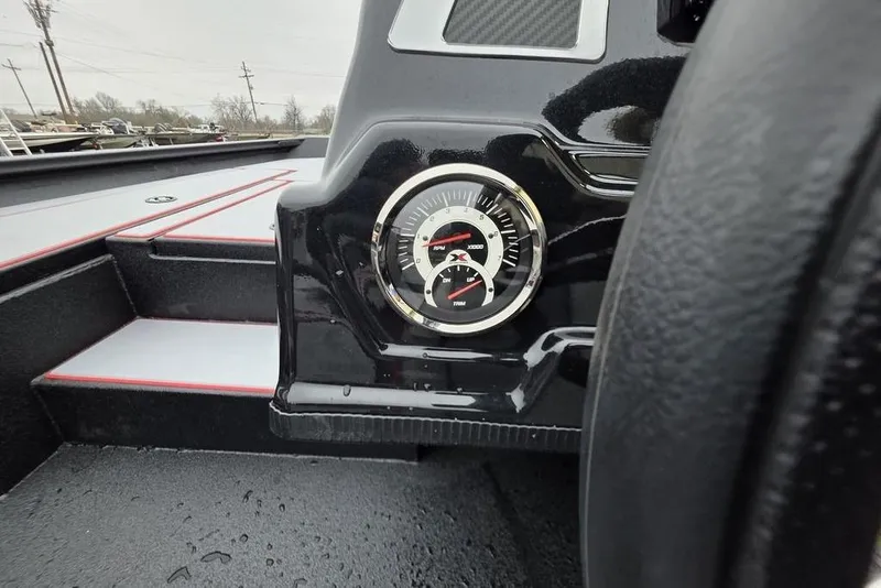 Slide: The Image of Dashboard of 2026 Xpress H17 boat with gauge and sleek design. - 11