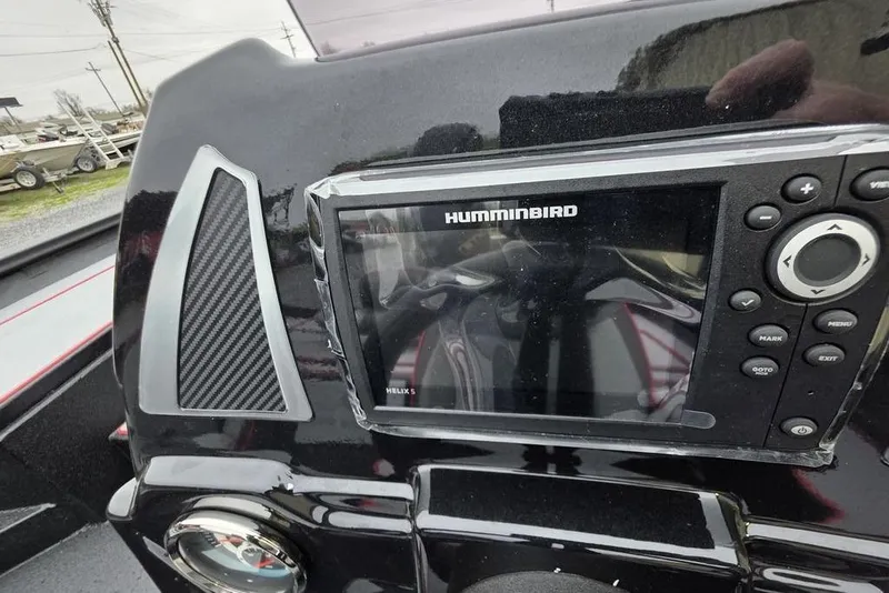 Slide: The Image of Dashboard of 2026 Xpress H17 boat with Humminbird fish finder display. - 12