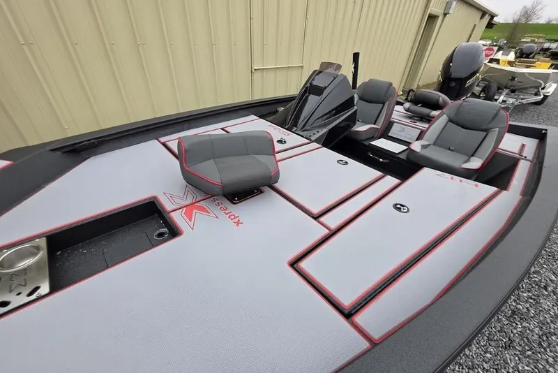 Slide: The Image of 2026 Xpress H17 boat with sleek seating and storage compartments. - 16