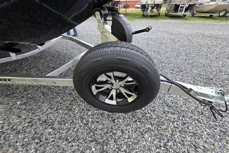 Slide: The Image of Trailer wheel of 2026 Xpress H17 on gravel surface. - 20