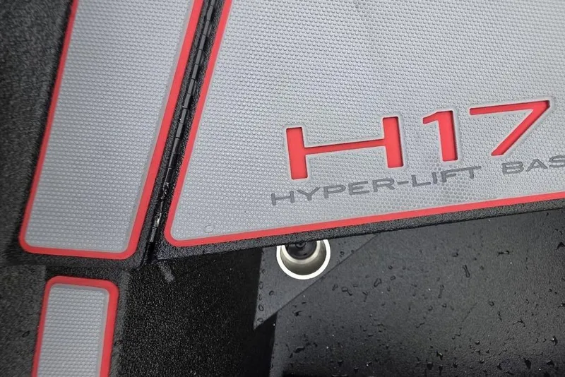 Slide: The Image of 2026 Xpress H17 Hyper-Lift Bass boat floor detail with red accents. - 6