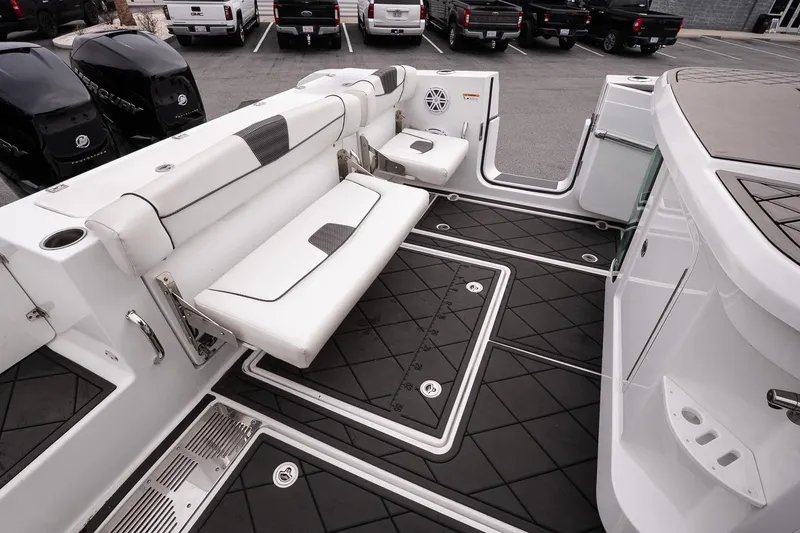 Slide: The Image of 2023 Wellcraft 352 Fisherman boat interior with seating and storage compartments. - 15