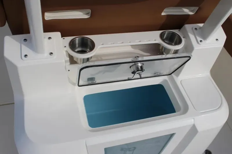 Slide: The Image of 2026 Pioneer 270 Pelagic boat console with cup holders and storage compartment. - 7