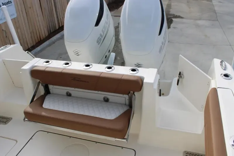 Slide: The Image of 2026 Pioneer 270 Pelagic boat with dual engines and cushioned seating. - 8