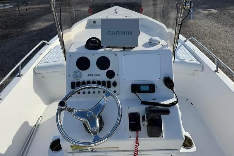 Slide: The Image of 2007 Sea Pro SV1900CC Bay Boat console with Garmin navigation system. - 14