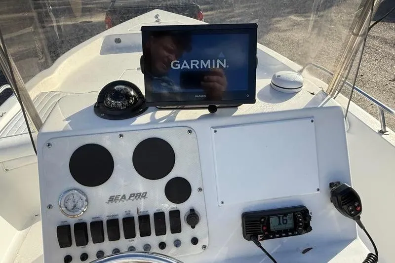 Slide: The Image of 2007 Sea Pro SV1900CC Bay Boat dashboard with Garmin GPS and control panel. - 15