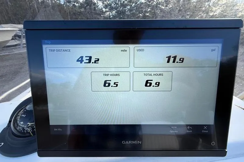 Slide: The Image of Garmin display on 2007 Sea Pro SV1900CC Bay Boat showing trip data: 43.2 miles, 11.9 gallons used. - 19