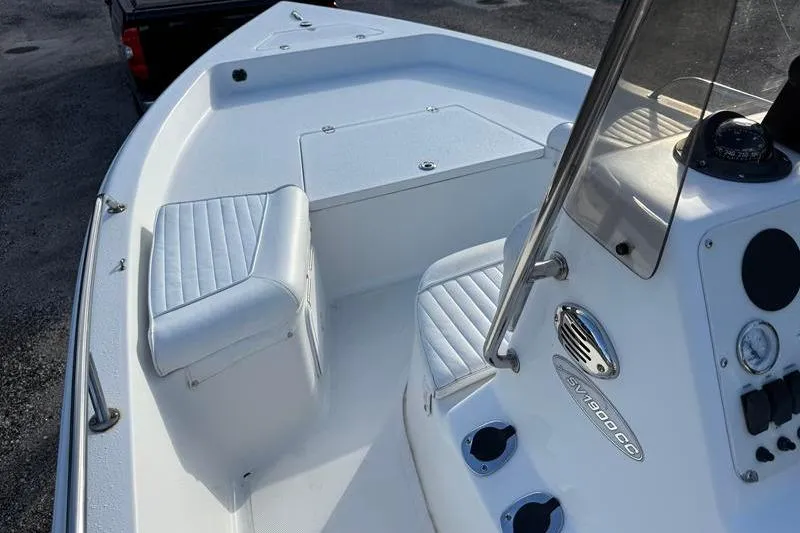 Slide: The Image of 2007 Sea Pro SV1900CC Bay Boat interior with seating and console details. - 21