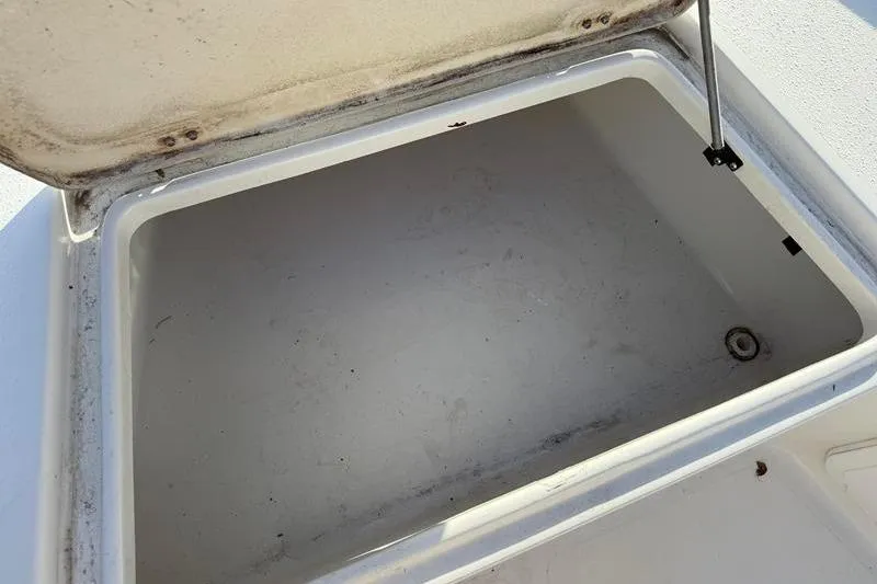 Slide: The Image of Open storage compartment on a 2007 Sea Pro SV1900CC Bay Boat. - 22