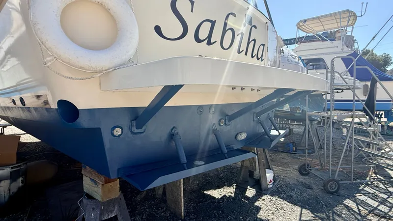 Slide: The Image of 2004 Mainship 400 Trawler in dry dock, rear view. - 3