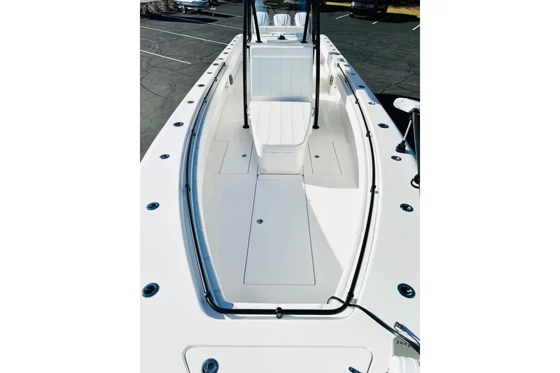 Slide: The Image of 2025 Contender 35 ST boat, sleek white deck, spacious layout, modern design. - 14