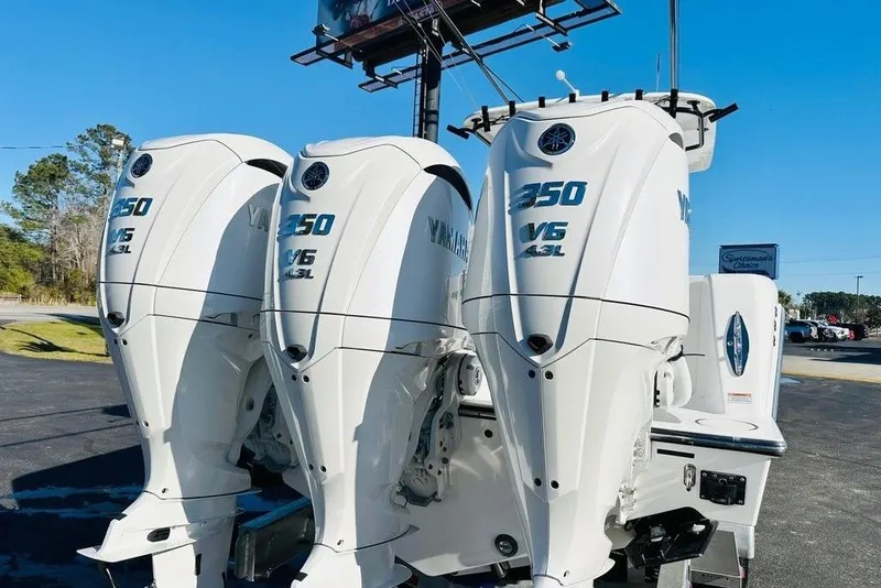 Slide: The Image of Triple Yamaha 350 V6 outboard engines on a 2025 Contender 35 ST boat. - 20
