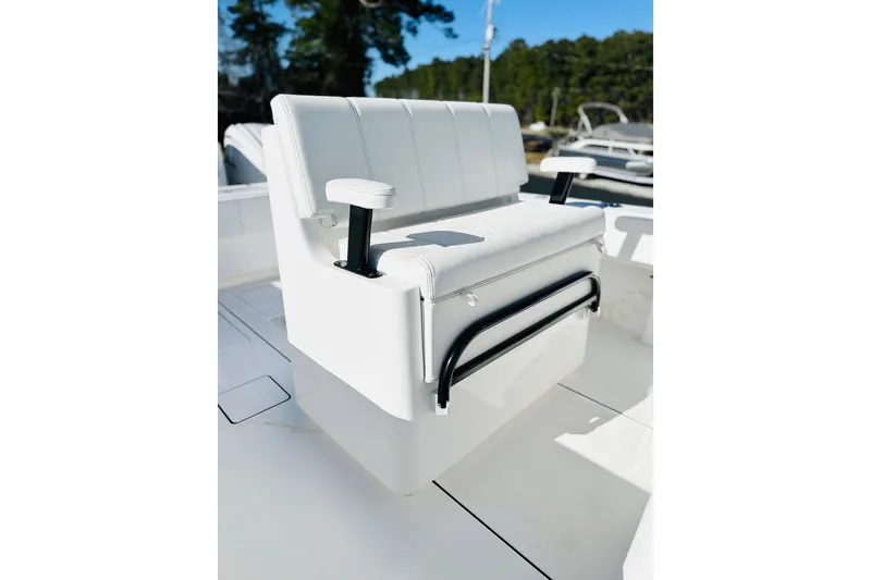 Slide: The Image of Throttle control panel of 2025 Contender 35 ST boat, featuring various function buttons. - 5