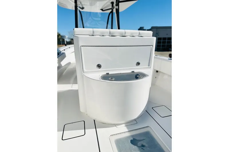 Slide: The Image of 2025 Contender 35 ST boat interior, featuring sleek white console design. - 6