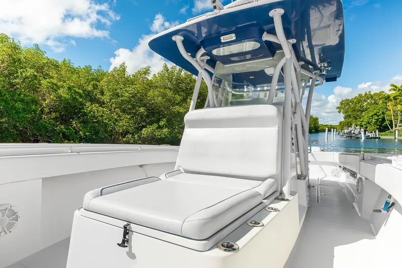 The Image of 2017 SeaHunter 35 Tournament boat with sleek seating, set against a lush, scenic backdrop. - 3