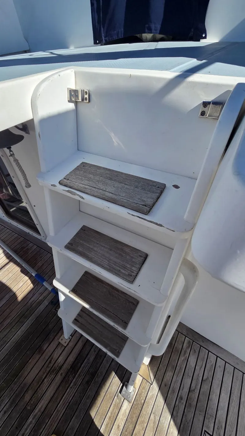 Slide: The Image of Staircase on a 1987 DeFever 48 Tri Cabin yacht. - 16