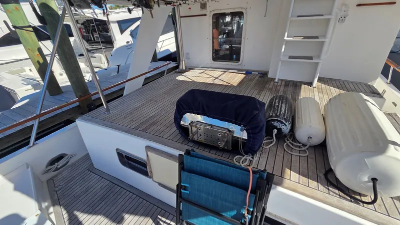 Slide: The Image of DeFever 48 Tri Cabin 1987 yacht deck with accessories. - 6