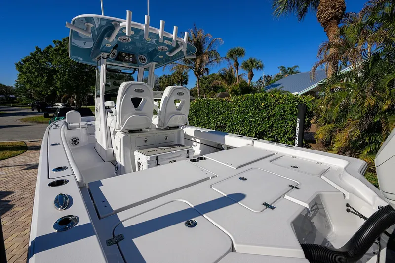 Slide: The Image of 2023 Sportsman Masters 267 Bay Boat with sleek deck and modern features. - 17