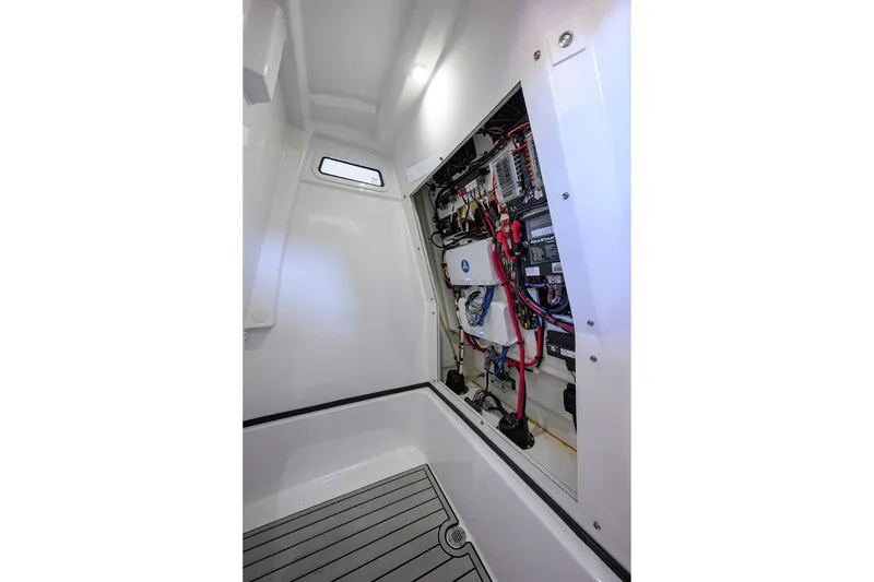 Slide: The Image of 2023 Sportsman Masters 267 Bay Boat interior wiring and electrical panel. - 30