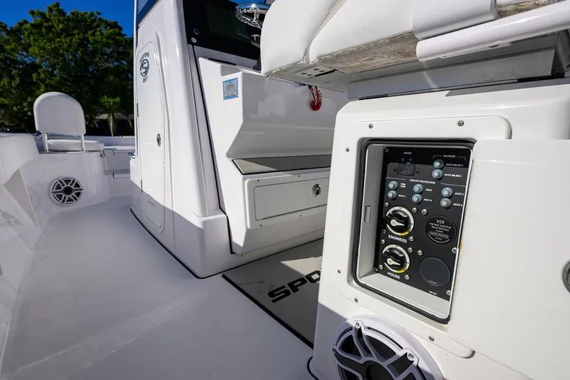 Slide: The Image of 2023 Sportsman Masters 267 Bay Boat interior with control panel and seating. - 41