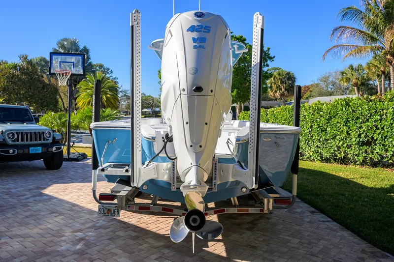 Slide: The Image of 2023 Sportsman Masters 267 Bay Boat with Yamaha 425 V8 engine in driveway. - 42