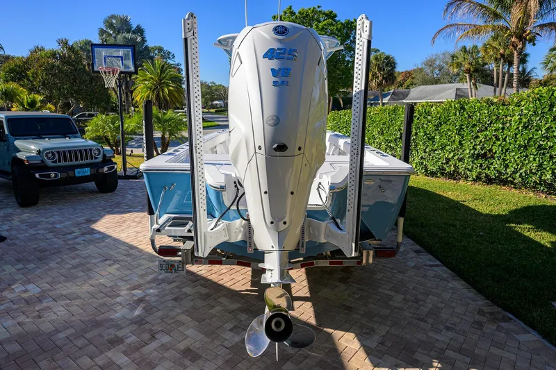 Slide: The Image of 2023 Sportsman Masters 267 Bay Boat with Yamaha 425 V8 engine in driveway. - 43