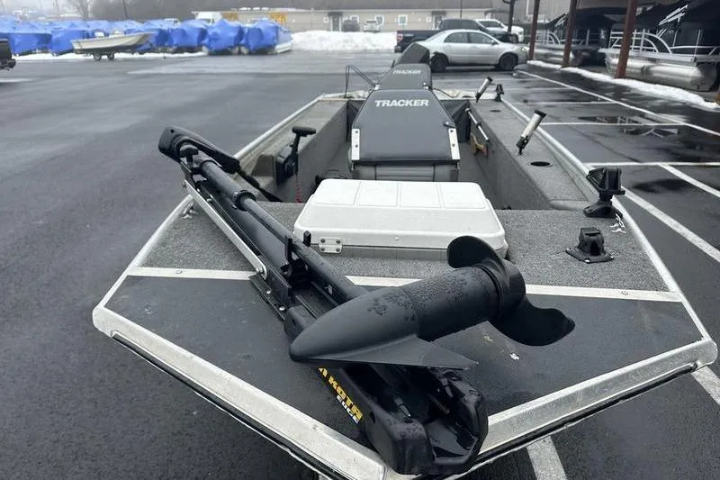 Slide: The Image of 1992 Tracker Panfish 16 boat with trolling motor in parking lot. - 10