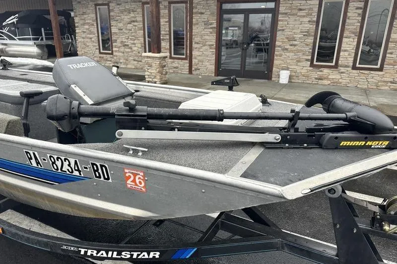 Slide: The Image of 1992 Tracker Panfish 16 boat with Minn Kota trolling motor on trailer. - 9