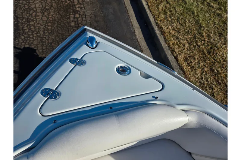 Slide: The Image of 2018 Crownline 275 SS boat bow with sleek white seating and stainless steel fittings. - 20